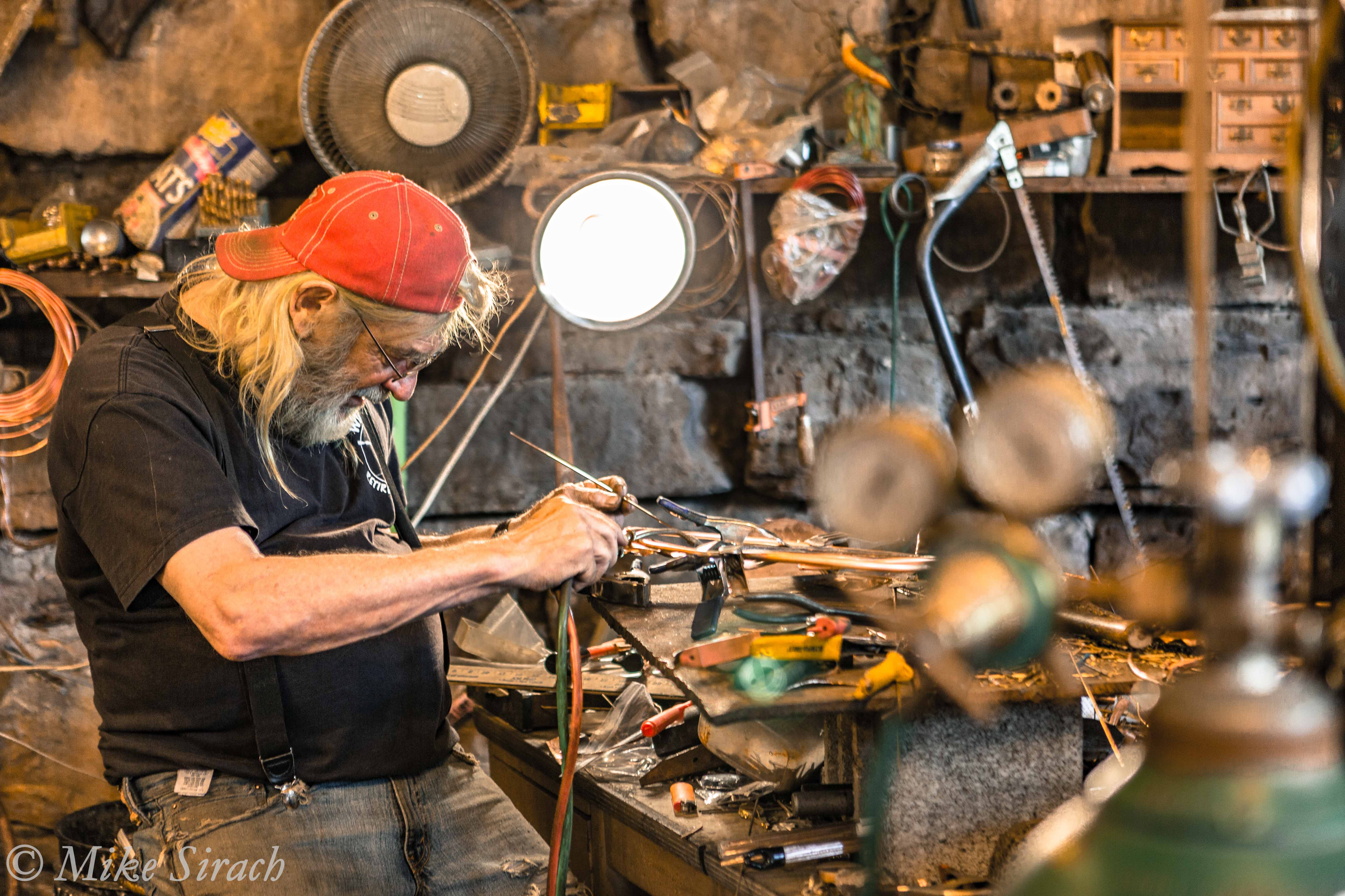 An artisan at work in the Rain Maker Studios workshop in Makanda