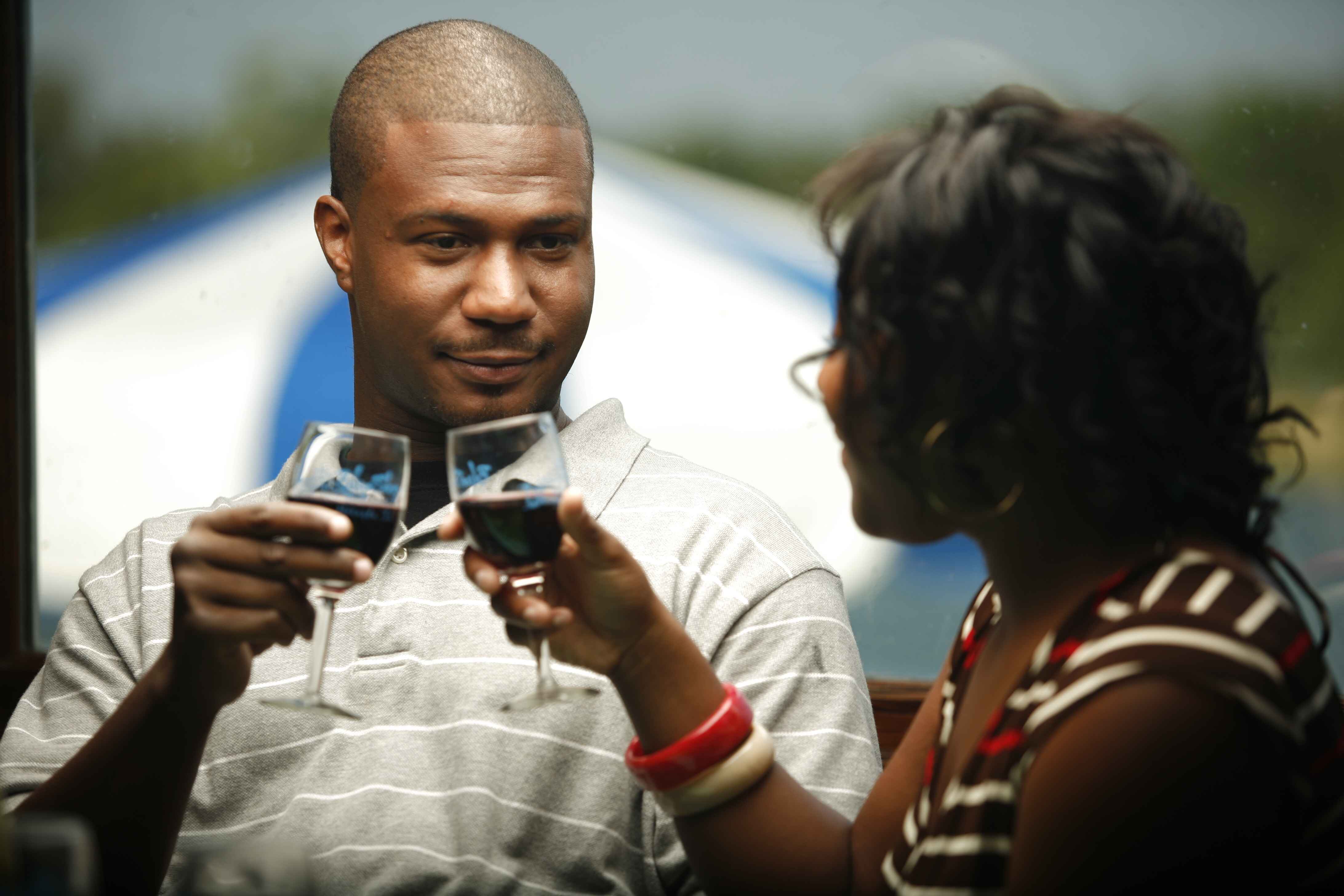 Two people drinking wine