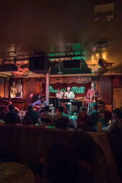 People watch a performance at the Green Mill