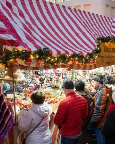 A market shop with people looking in