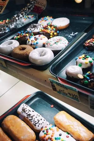 Sweets on trays inside glass container