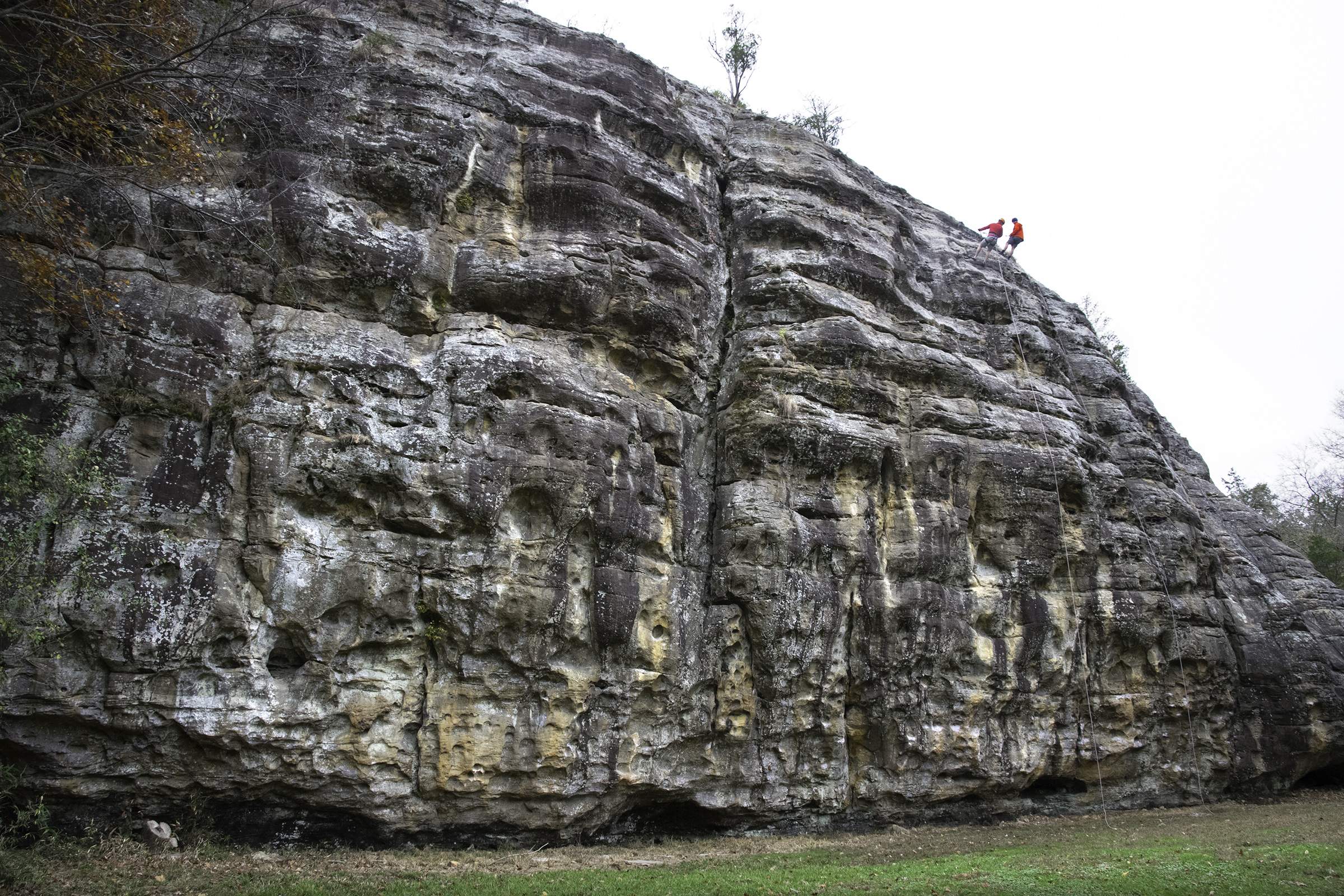 People climbing Giant City Bluff in Makanda