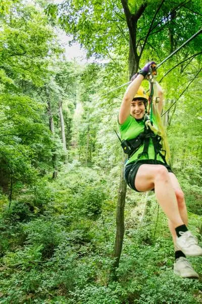 A woman on a zipline in Shawnee National Forest