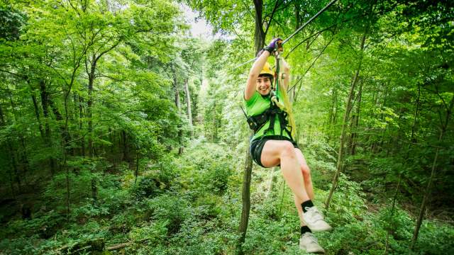 A woman on a zipline in Shawnee National Forest