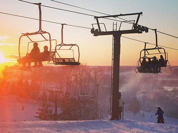 Ski lifts at Chestnut Mountain Resort during winter