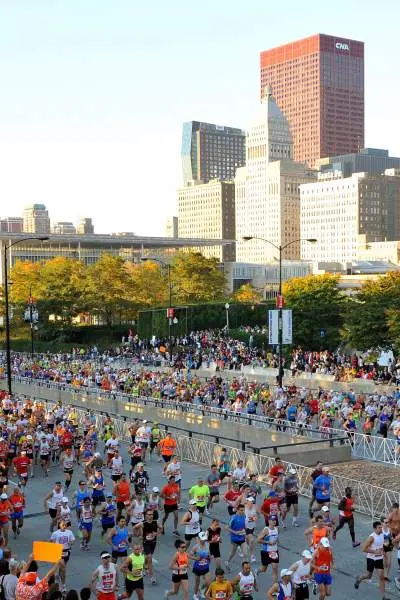 Lots of runners running along the street